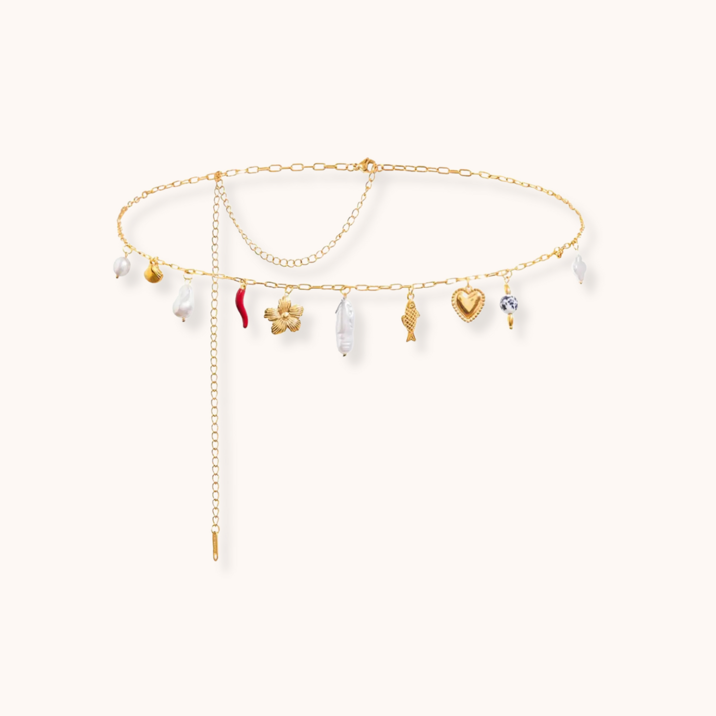 Gold waist chain with multiple charms including heart, pearl, star, and chili pepper on an adjustable stainless steel chain.