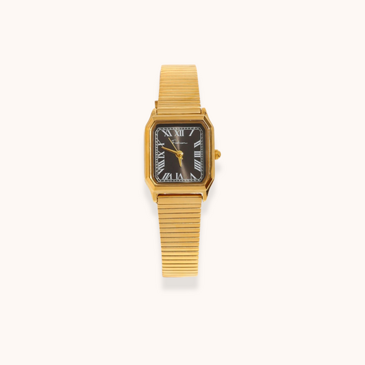 Elegant rectangular gold wristwatch with Roman numeral dial on white/black background – waterproof and hypoallergenic design