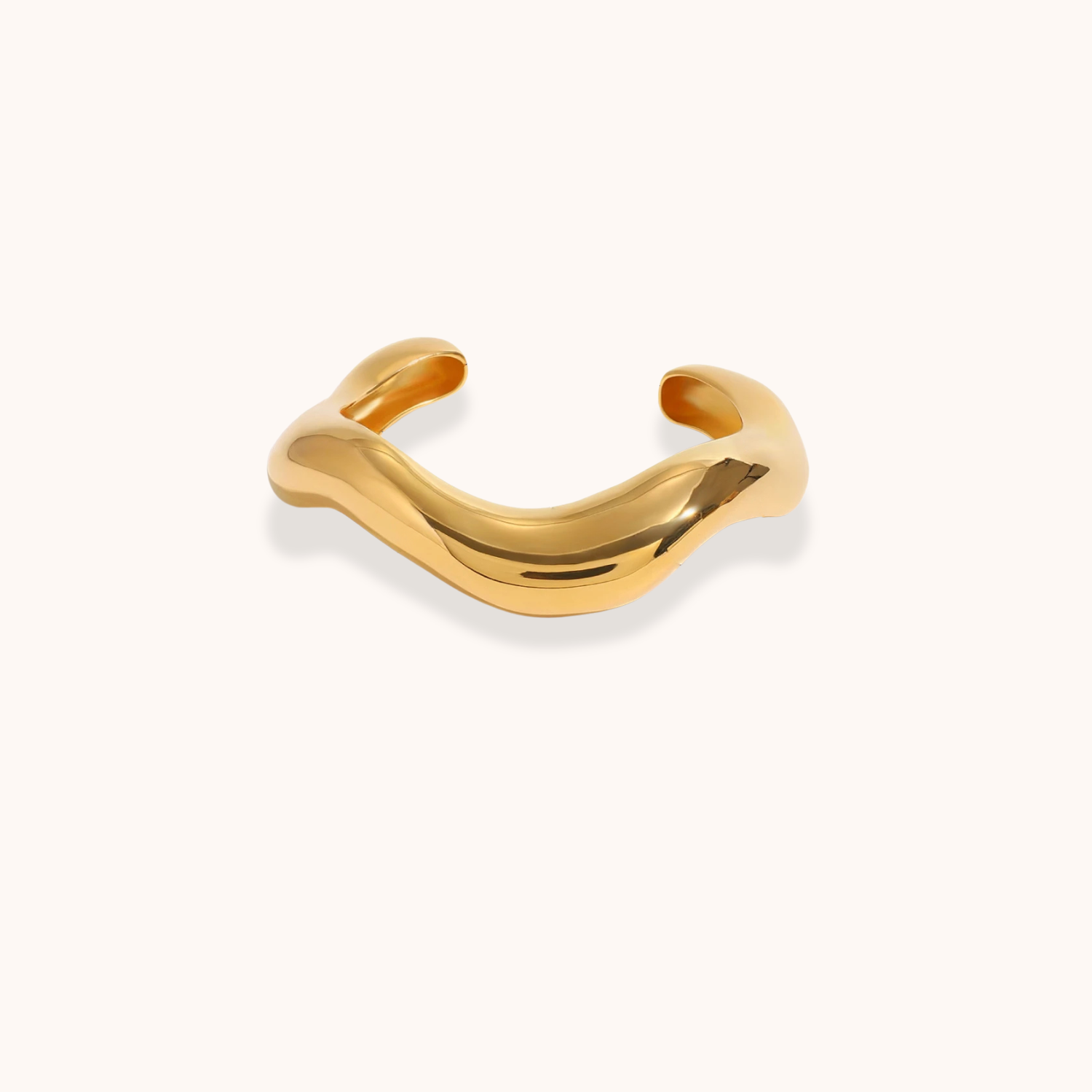Curved gold waterproof cuff bracelet with polished sculptural design – Sol Wave Cuff by Aurelia Glamour