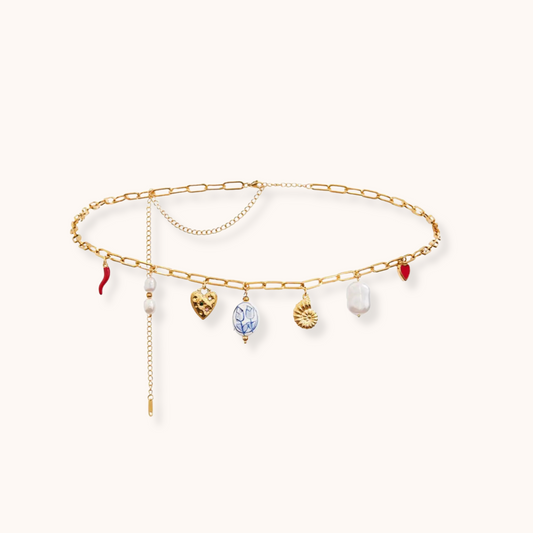 Gold waist chain with pre-attached ocean-inspired charms, adjustable fit.