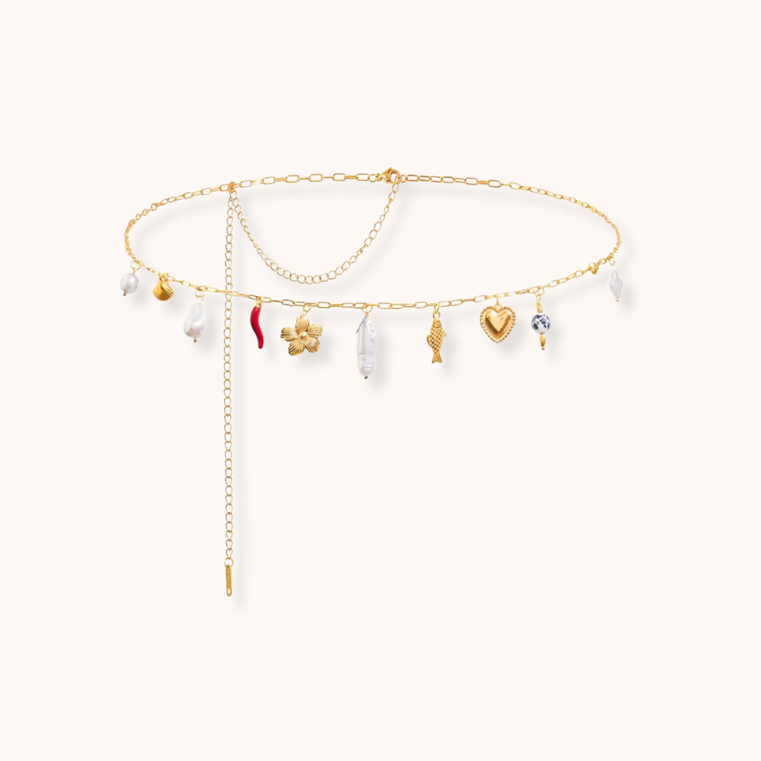 Gold waist chain with multiple charms including heart, pearl, star, and chili pepper on an adjustable stainless steel chain.