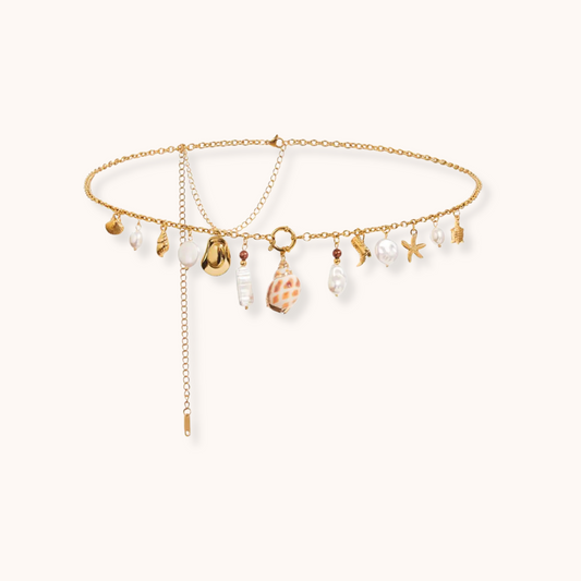 Gold-plated adjustable waist chain adorned with pearl, shell, and heart charms; displayed on white background with size reference.