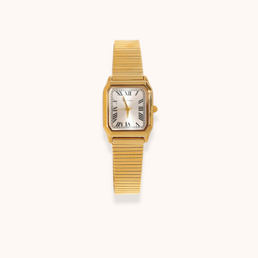 Elegant rectangular gold wristwatch with Roman numeral dial on white background – waterproof and hypoallergenic design