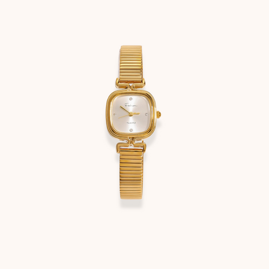 Gold Vera Watch with white dial on white background